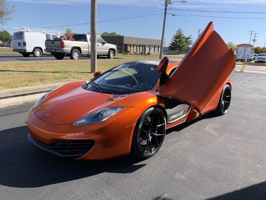  McLaren MP4-12C 2012 года  (фото 2 из 48)